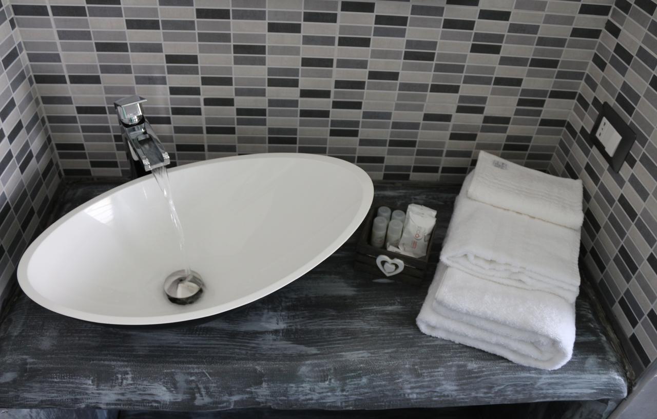 Apple Rooms Rome Airport Fiumicino Exterior foto Bathroom amenities