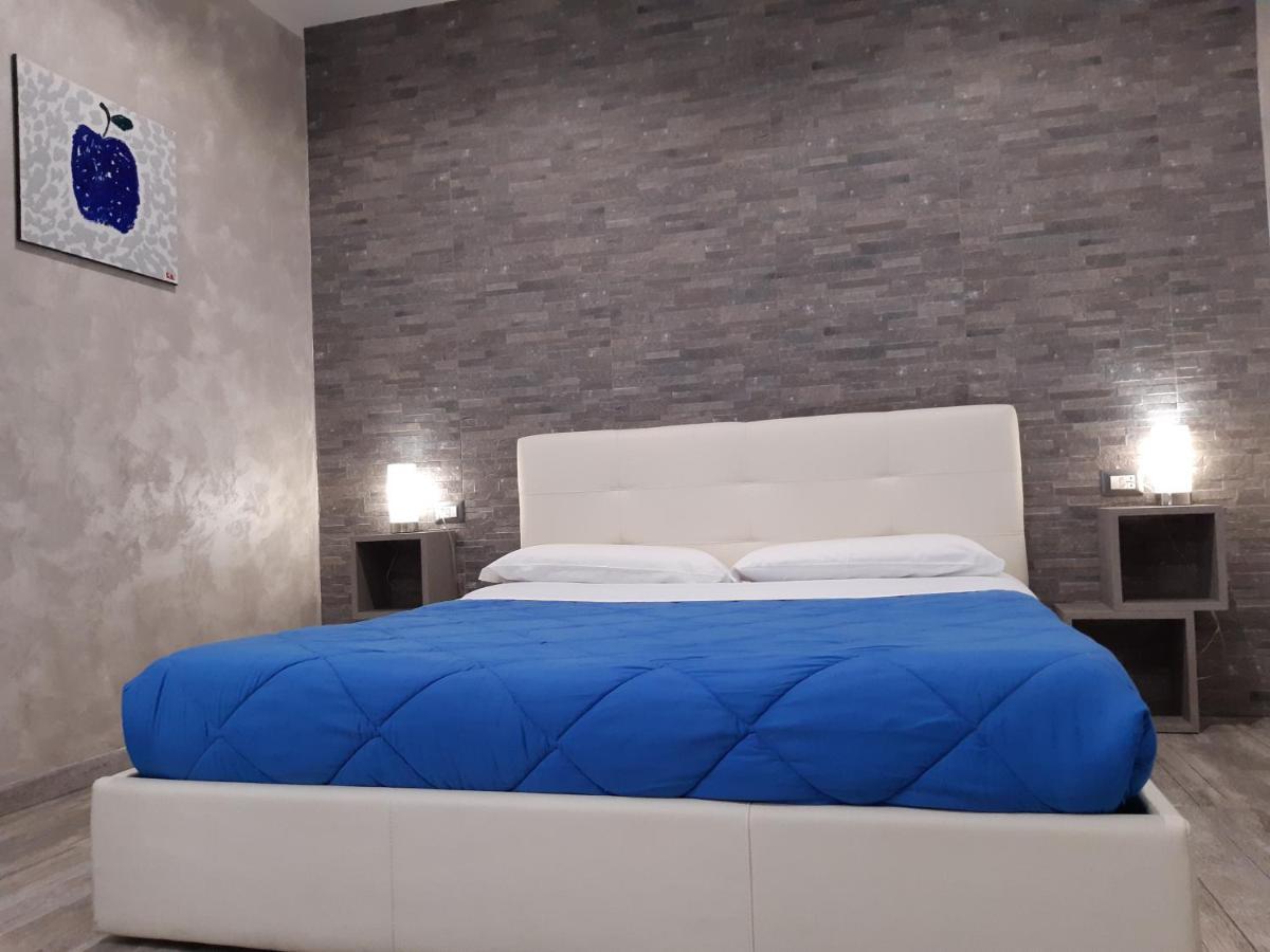 Apple Rooms Rome Airport Fiumicino Exterior foto A bed
