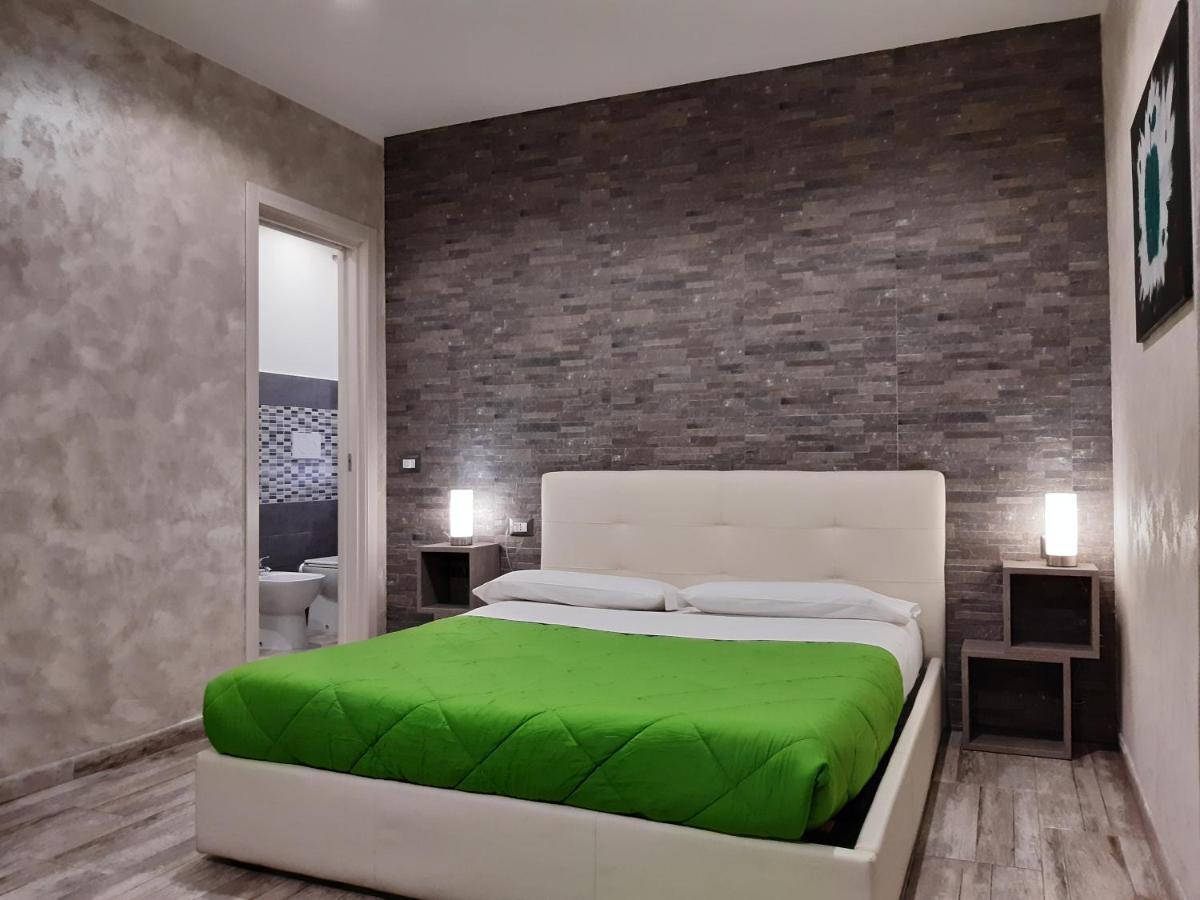Apple Rooms Rome Airport Fiumicino Exterior foto A bedroom